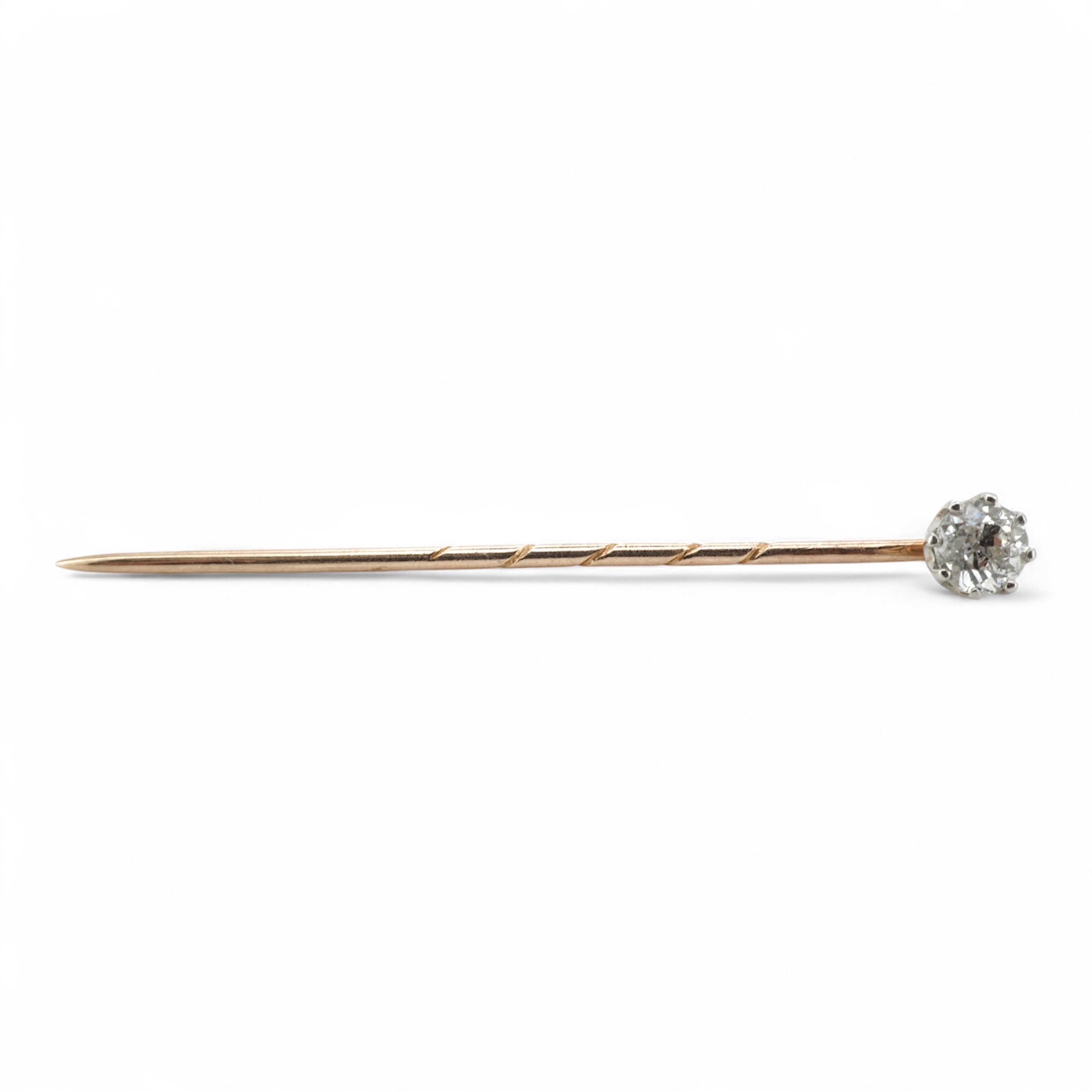 A diamond stick pin, early 20th century, claw-set with a circular-cut diamond weighing approximately 0.50 carats, mounted in gold, length 5.4cm